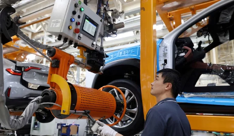 China factory activity hits one year high as demand improves but war risks cloud outlook