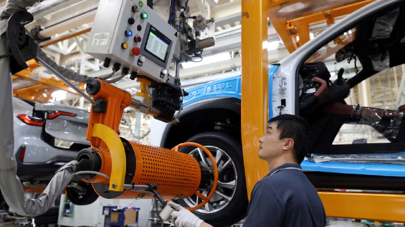 China factory activity hits one year high as demand improves but war risks cloud outlook