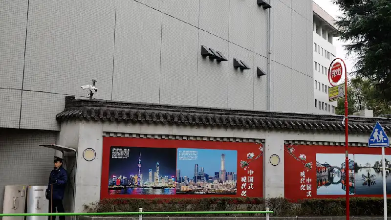 China urges Japan to punish military officer after embassy breach in Tokyo